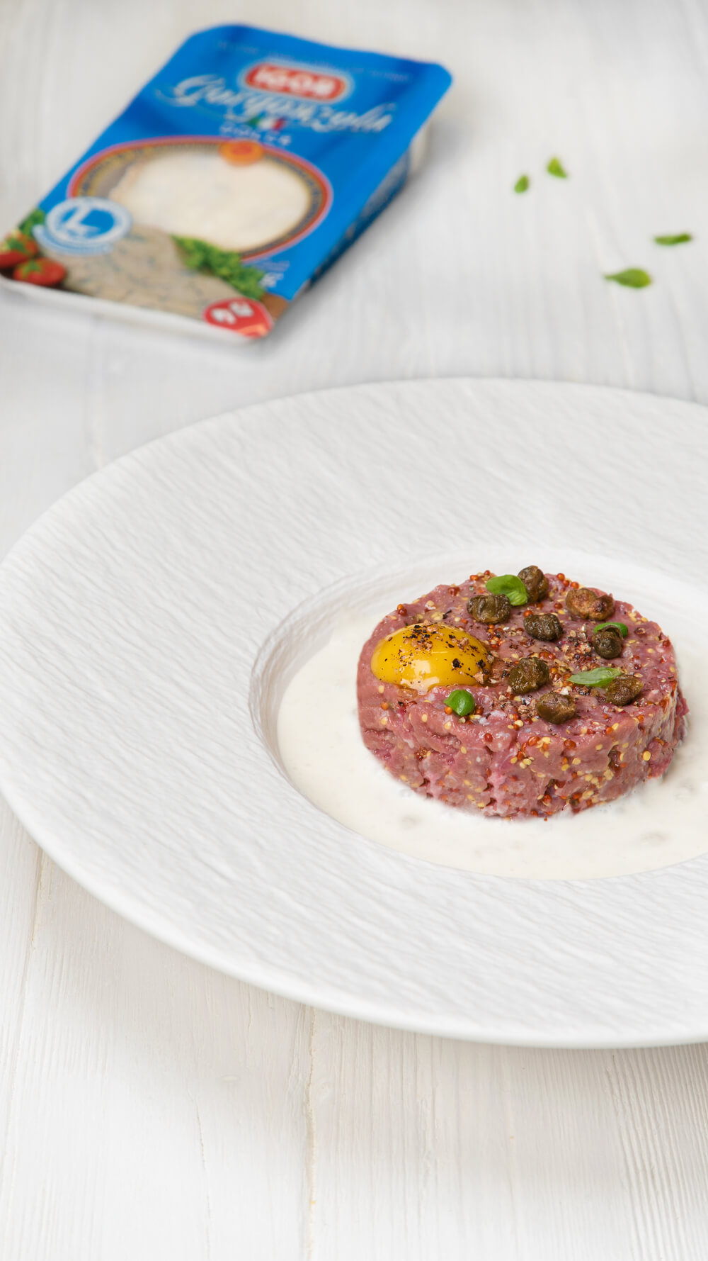 Beef tartare with mustard, capers, egg and sweet Gorgonzola
