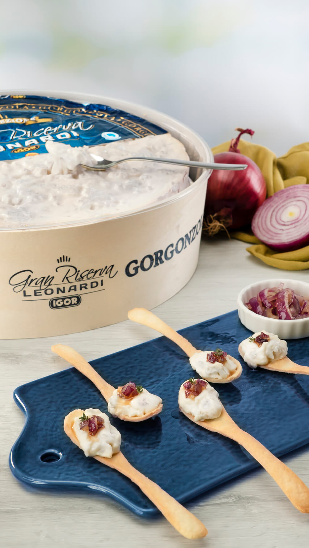 Leonardi Gran Riserva brisèe spoons and caramelized onions