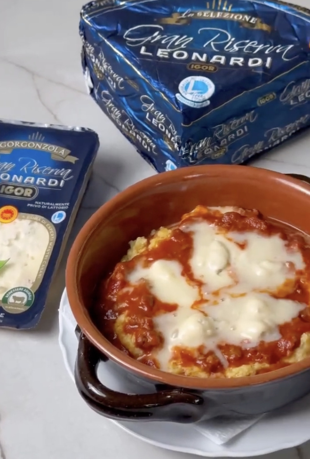 Polenta pasticciata with stewed sausage and sweet Gorgonzola IGOR Gran Riserva Leonardi