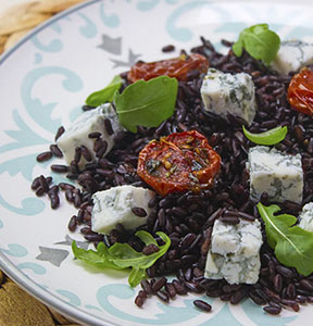 RISO VENERE CON POMODORI CONFIT AL LIMONE, RUCOLA E BLU DI CAPRA